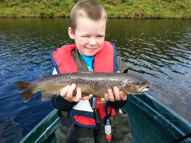 Kieran (age 7 ) caught his first brown trout weighing 2LB, 40cm fly fishing at Glengavel Reservoir on 25 August.